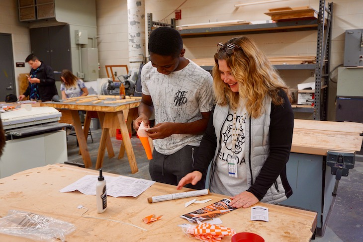 <p>RMS English Teacher Jamie Christopher shadowing her student in shop class.</p>
