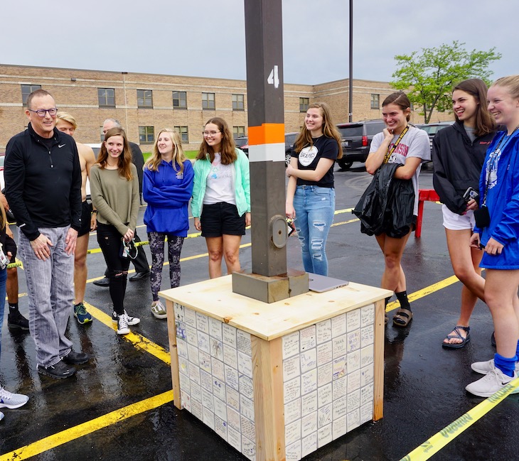The tile table created by Mr. Holm's colleagues and former students is portable and will become a piece of art in Mr. Holm's house. No doubt it will have a few books on it.